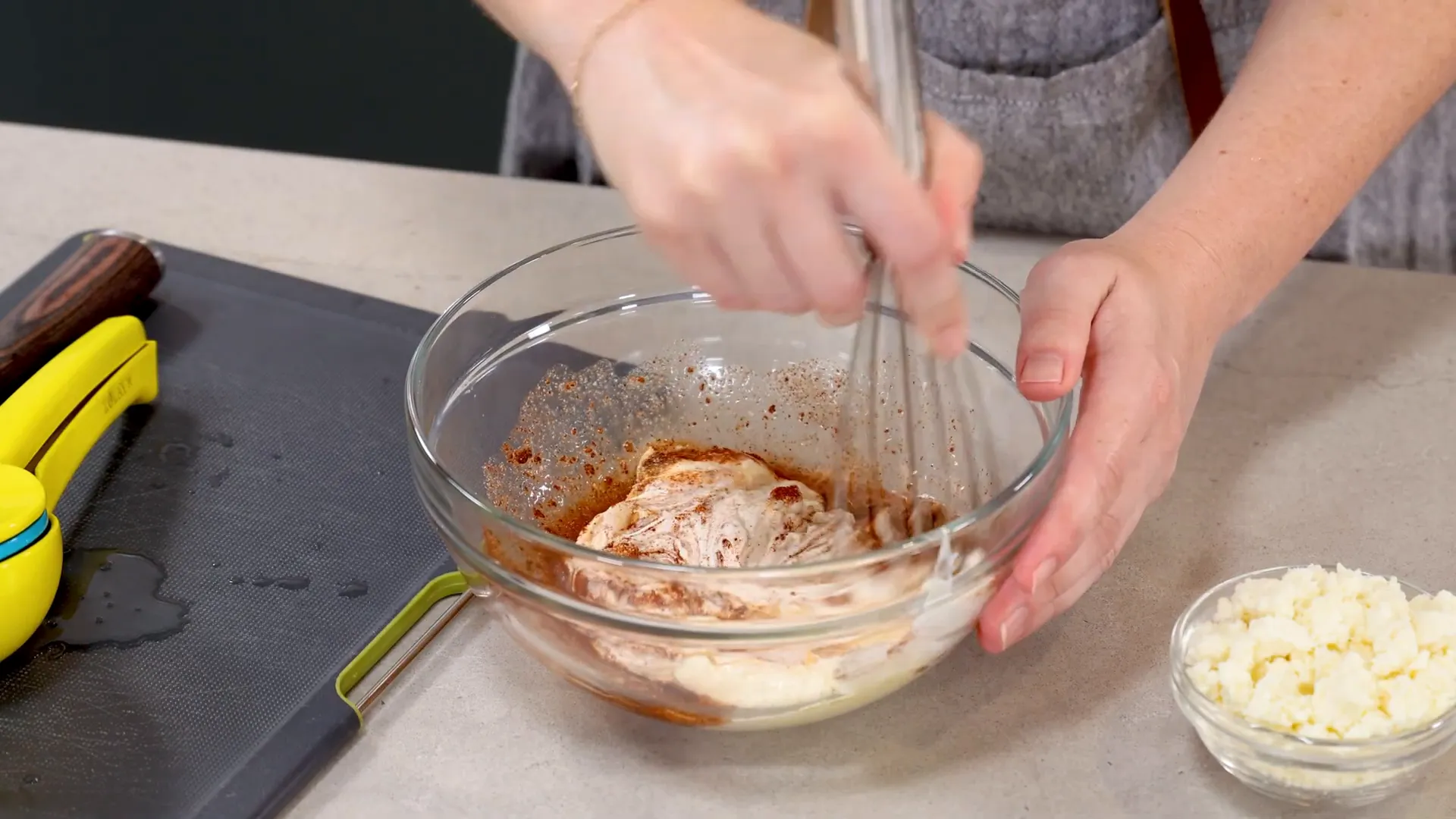 Mixing creamy chili-lime dressing in a bowl