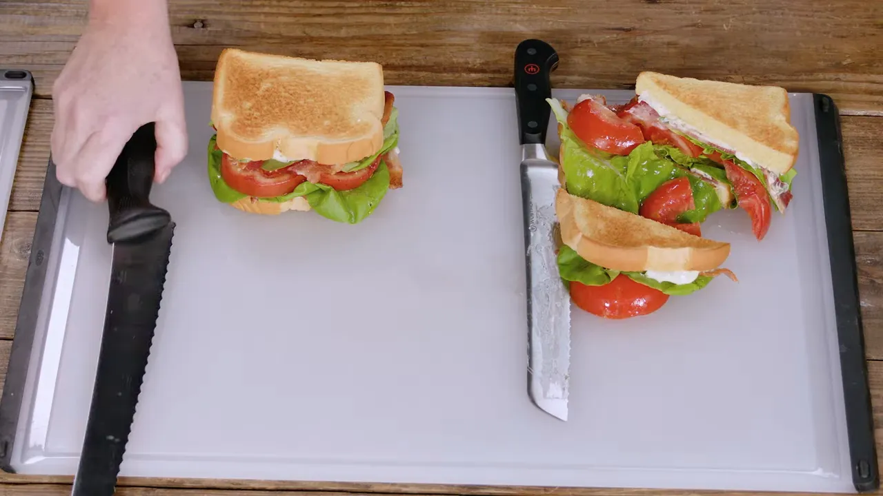 Top-down comparison of two serrated bread knives next to sliced sandwiches showing tooth size and spacing.