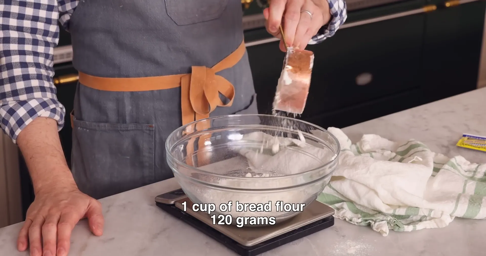 Measuring bread flour on a scale