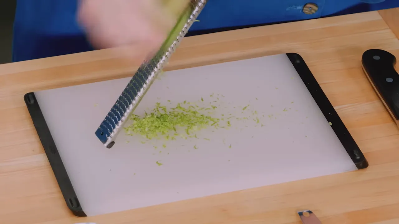 Zesting lemons and limes for the margarita mix