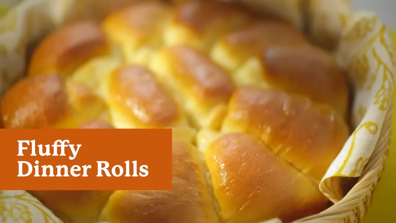 Coiled dinner rolls after shaping, ready to proof