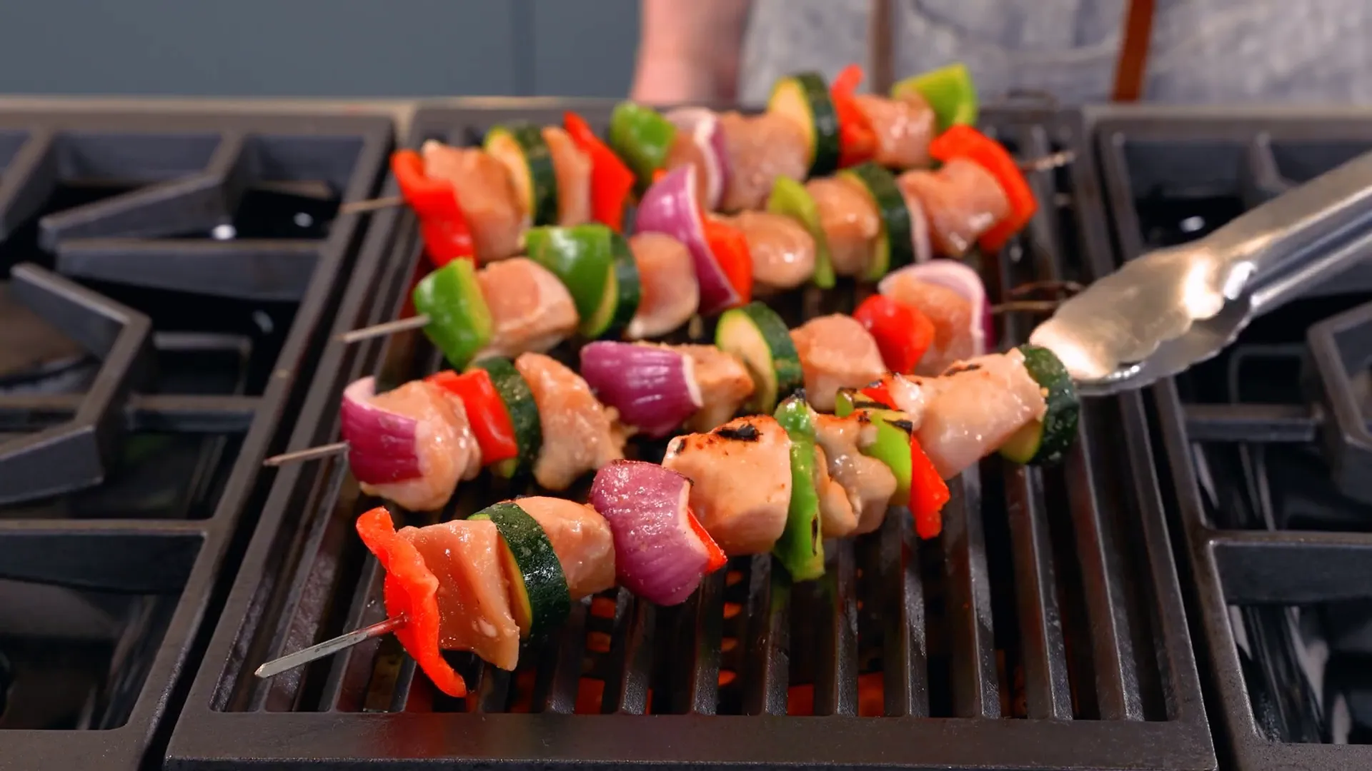 Grilled chicken kabobs cooking on the grill