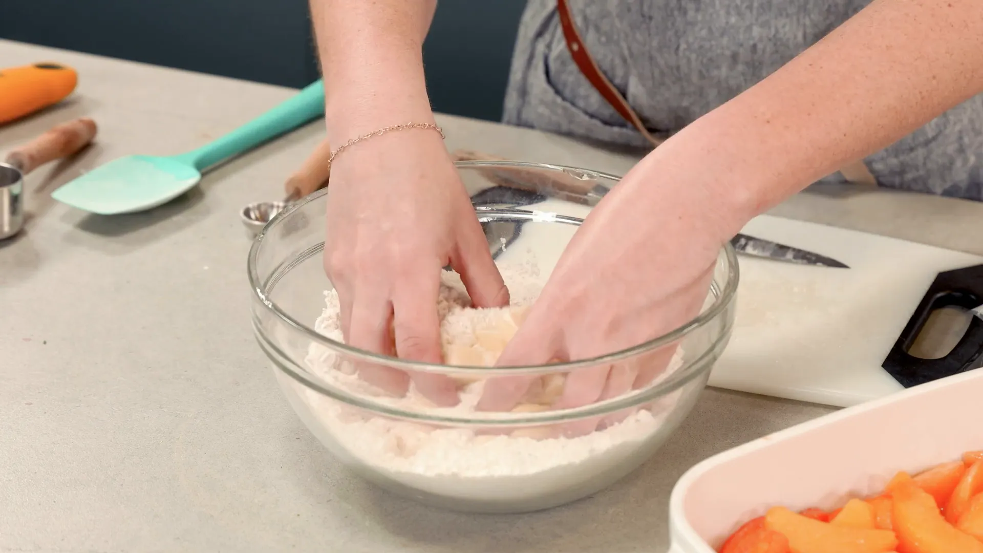 Cutting cold butter into flour mixture by hand