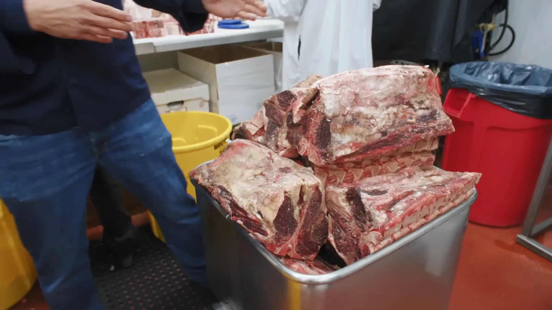 QC technician swabbing a machine for sanitation testing