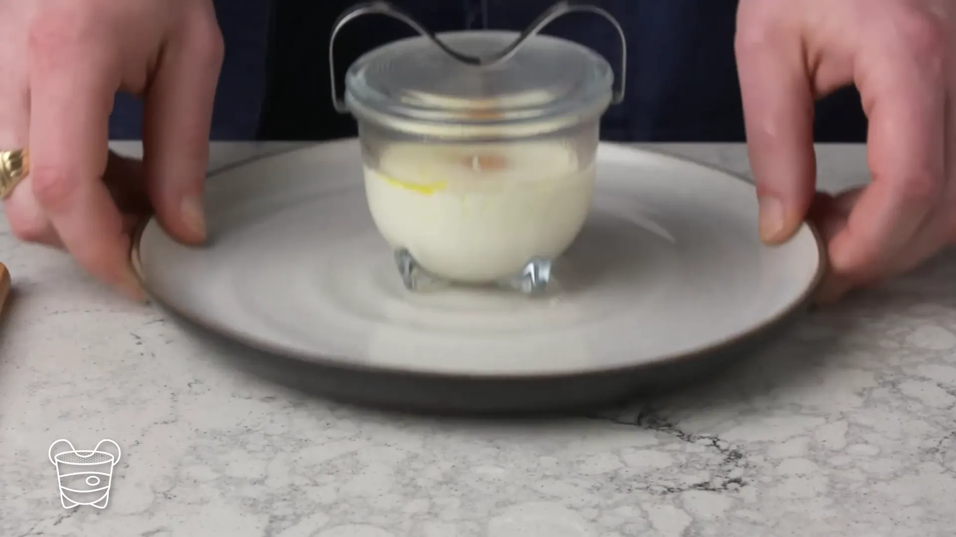 Egg coddler with cooked egg inside