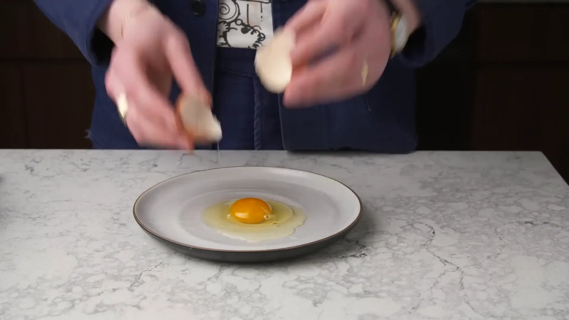 Large brown eggs cracked showing white and yolk