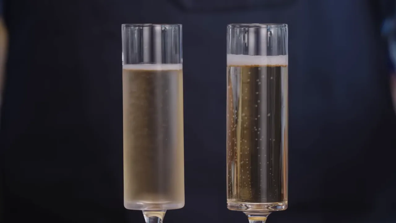 Two champagne flutes side by side showing different bubble streams and foam levels against a dark background