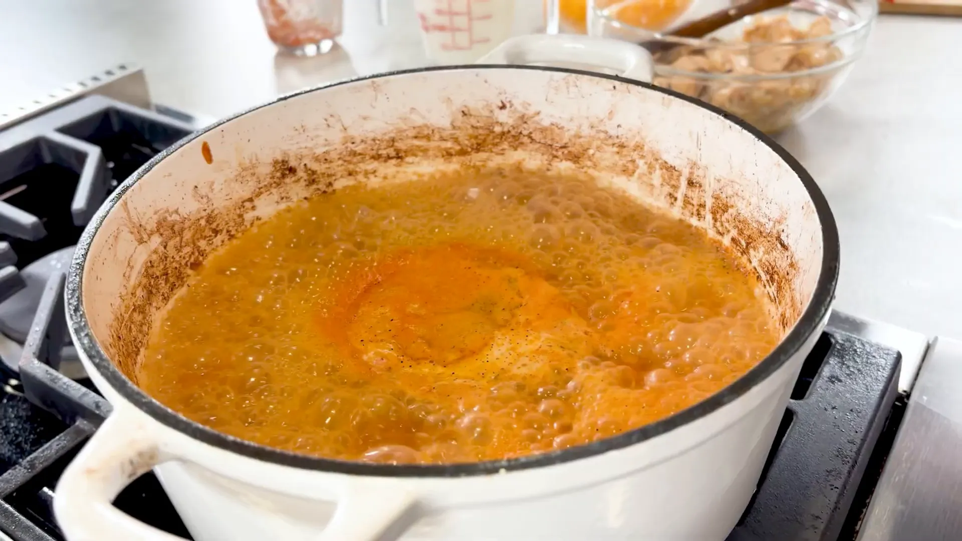 Simmering rice with broth and salsa