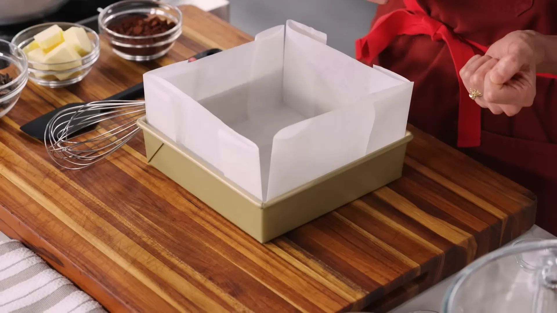 Preheating oven and lined nine-inch square pan