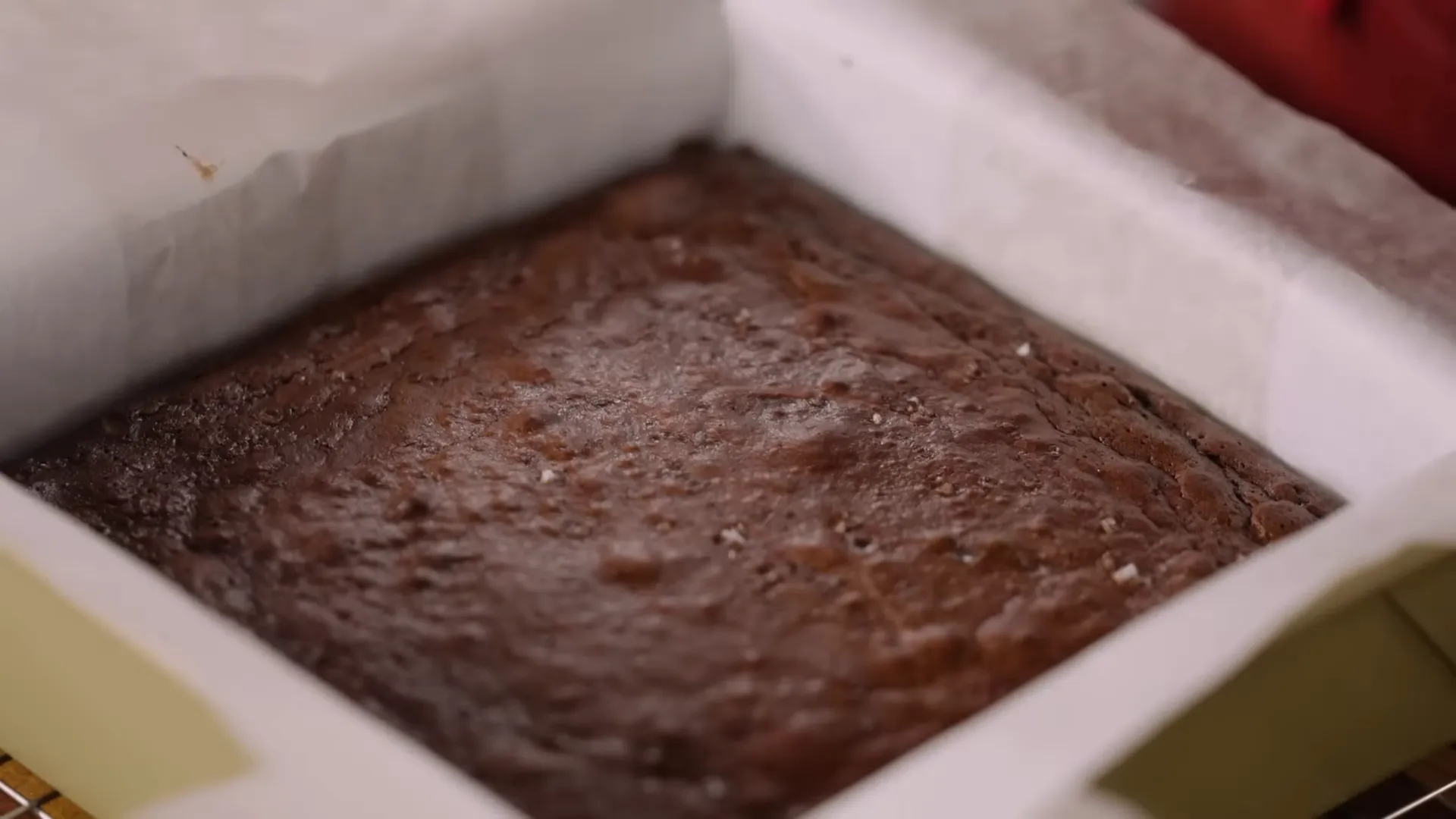 Freshly baked sourdough discard brownies with cracked top