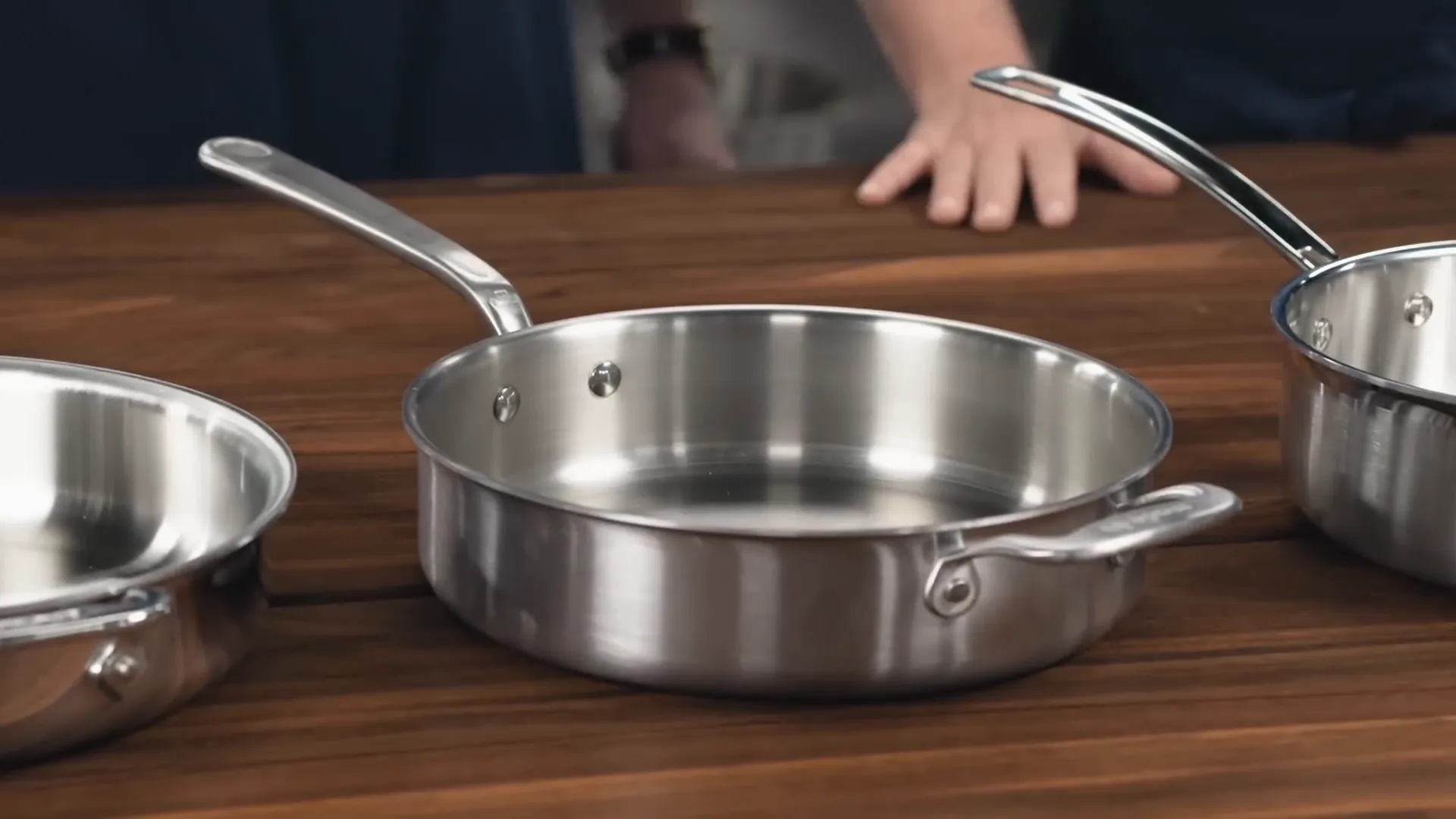 Made In stainless clad sauté pan with food inside on stovetop