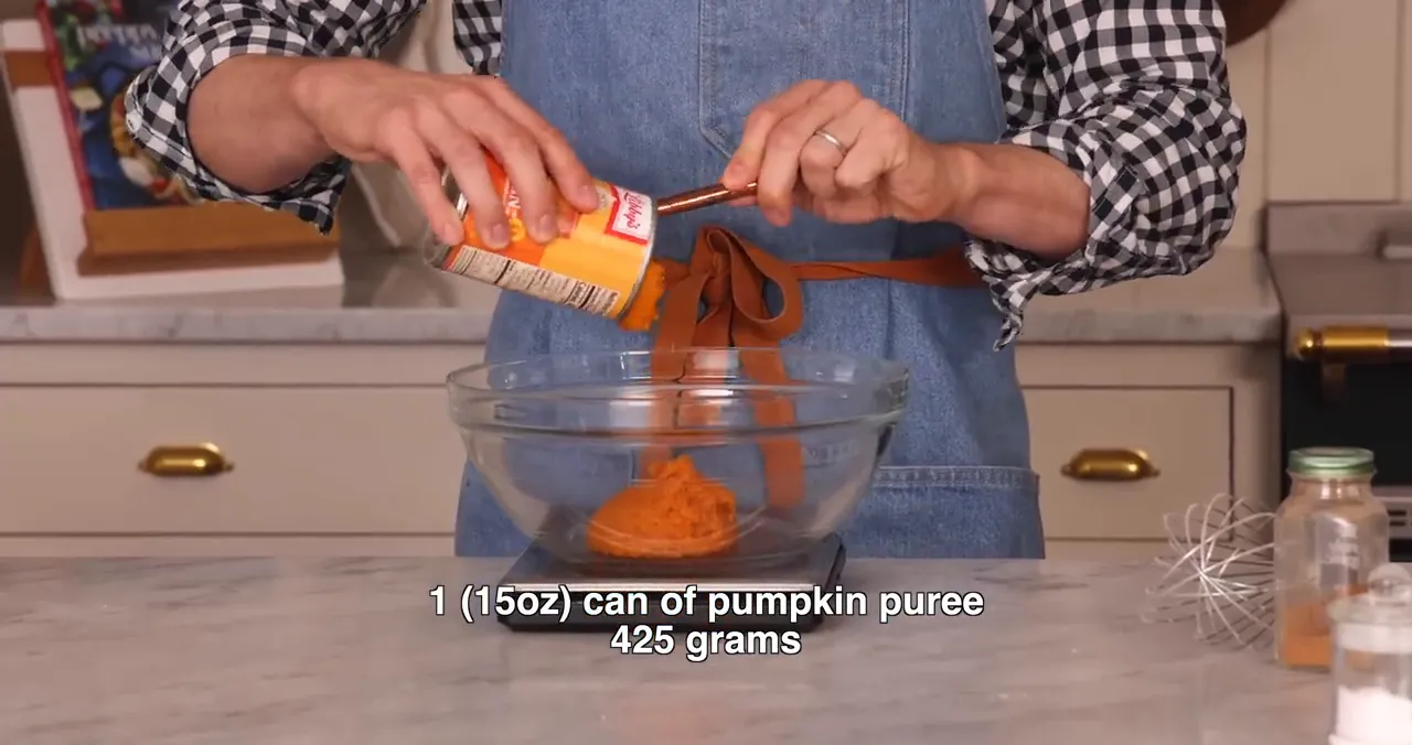 A 15-ounce can of pumpkin puree on the counter