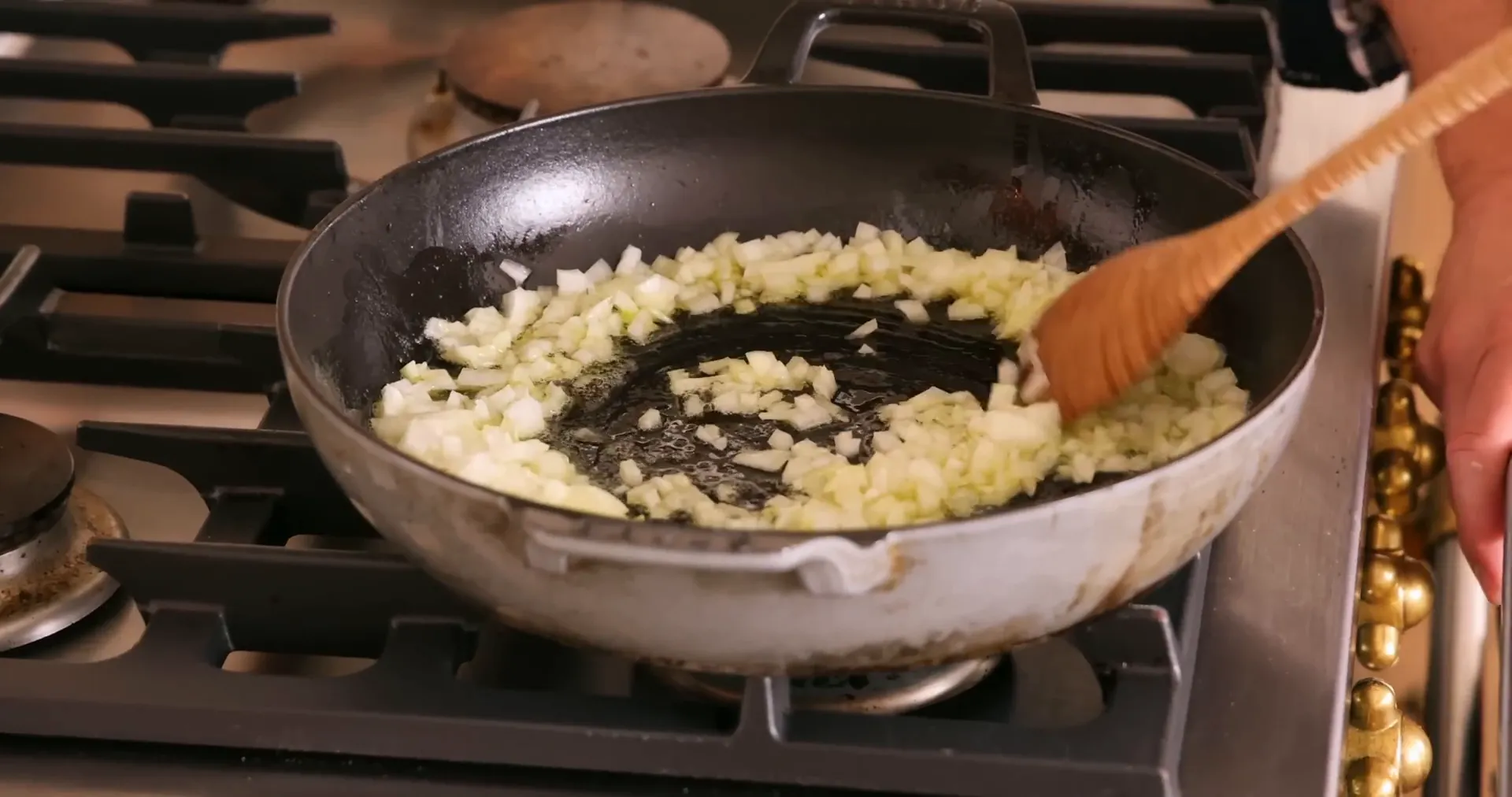 Onions cooking in butter and olive oil until translucent