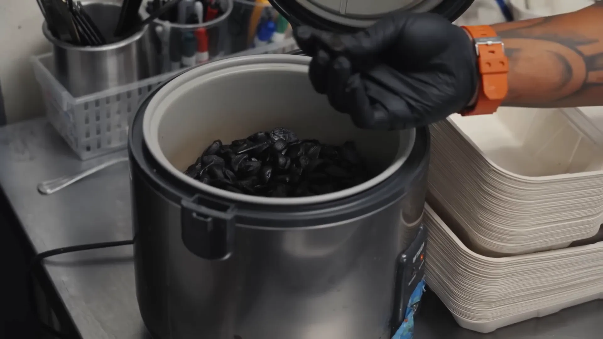 Black garlic being prepared in the kitchen