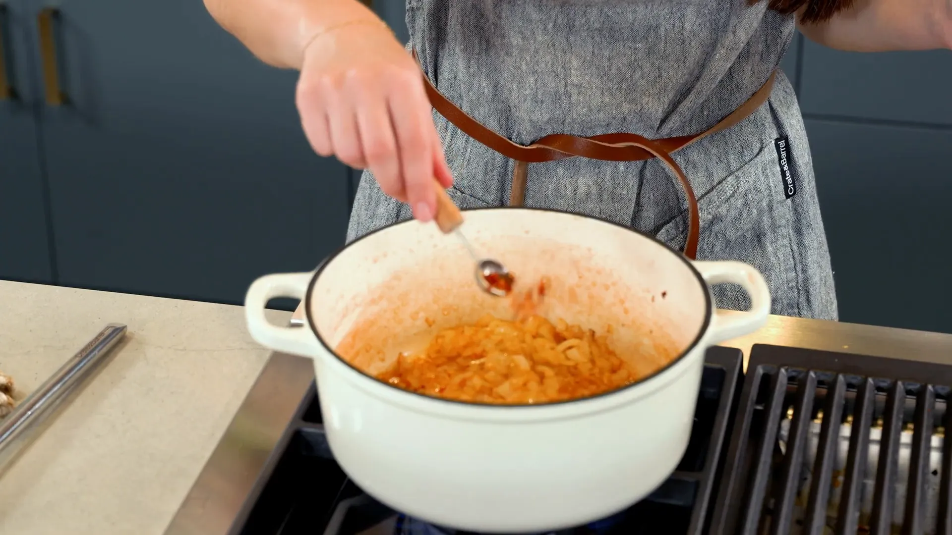 Diced onions cooking in olive oil until translucent