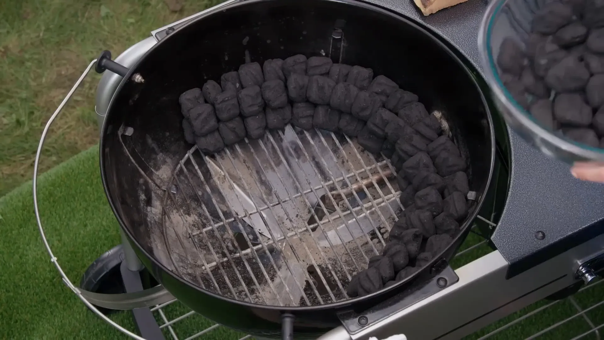 Charcoal snake setup with briquettes in a C shape