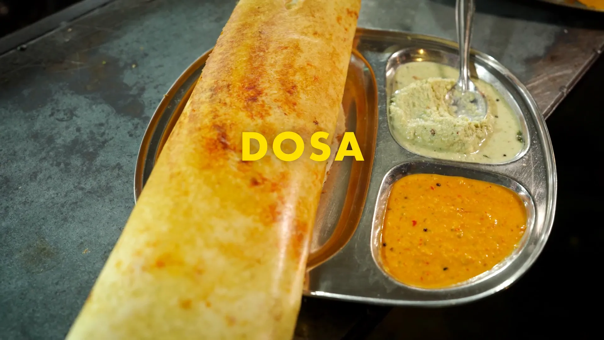 Perfectly golden dosa fresh off the griddle ready to be served