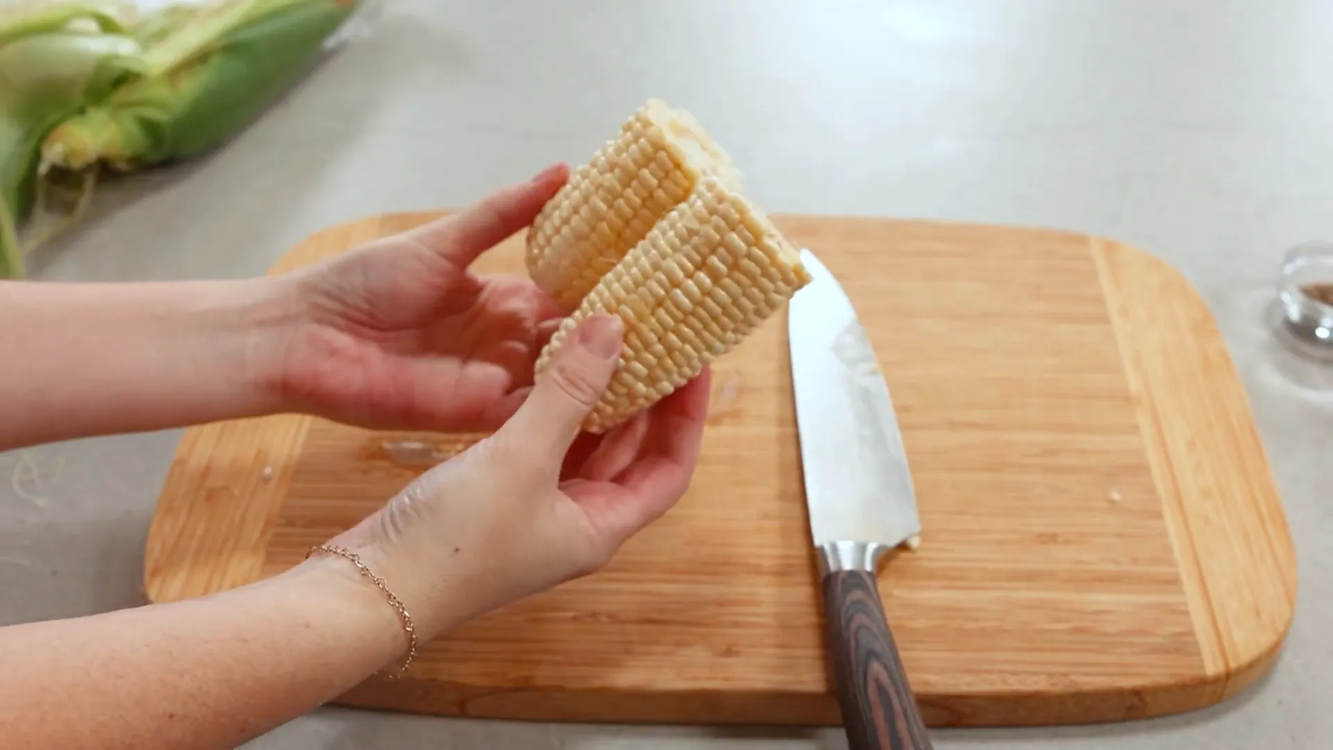 Corn ears broken in half for individual servings