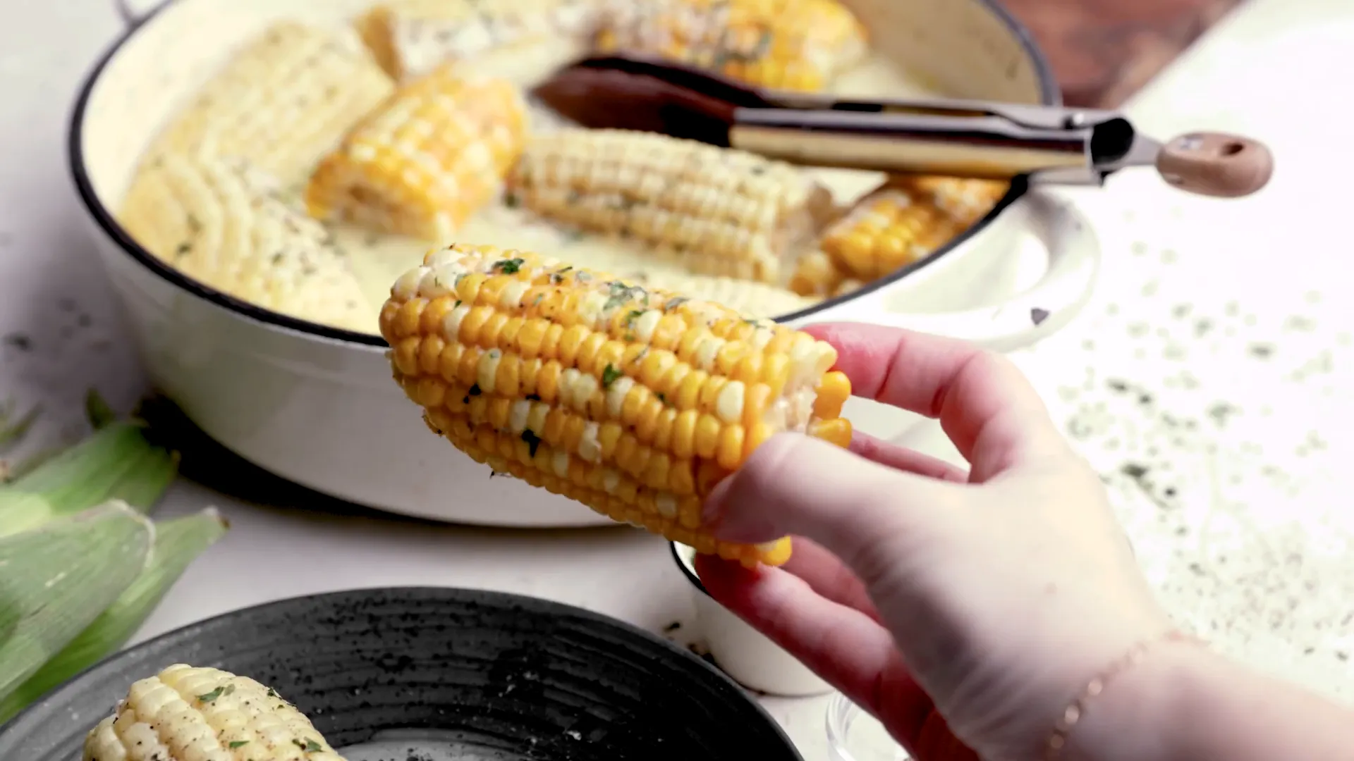 Butter boiled corn on the cob ready to serve