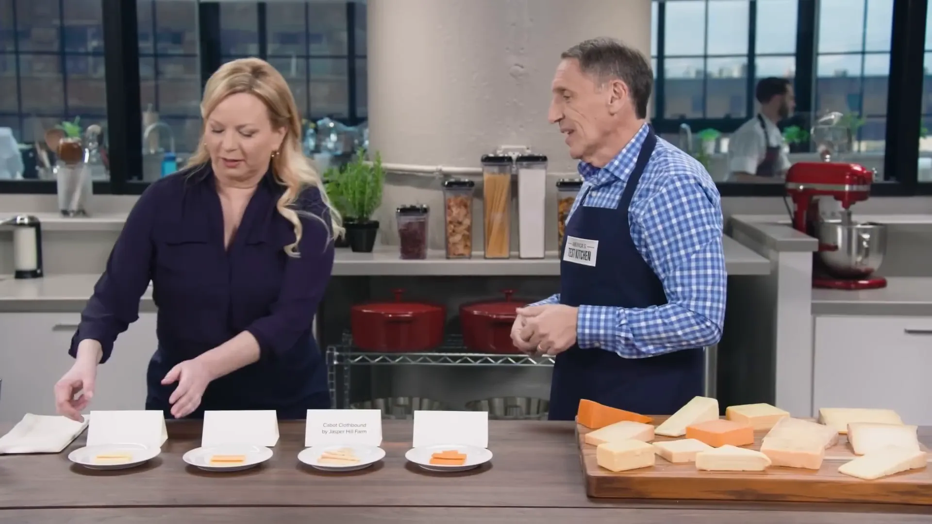 Selection of four American artisanal cheddars on a board