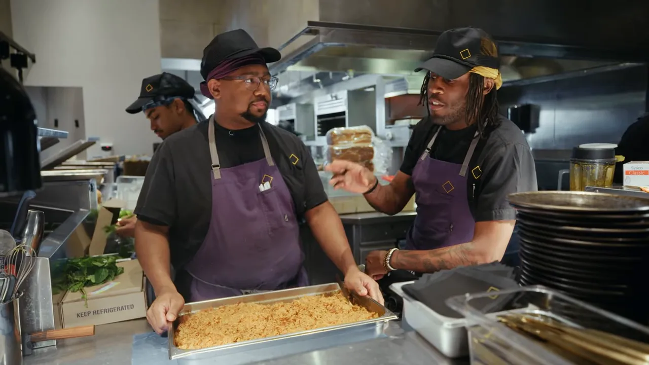 Jollof rice showing individual, moist grains ready for service
