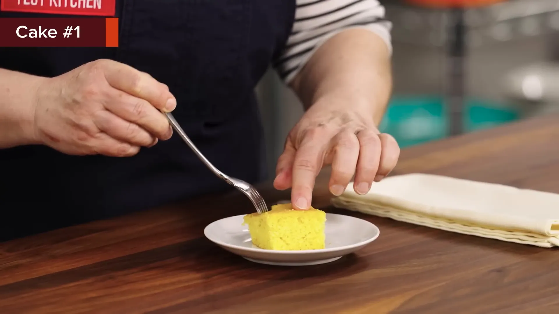 Close-up of a very yellow cake sample with an even crumb