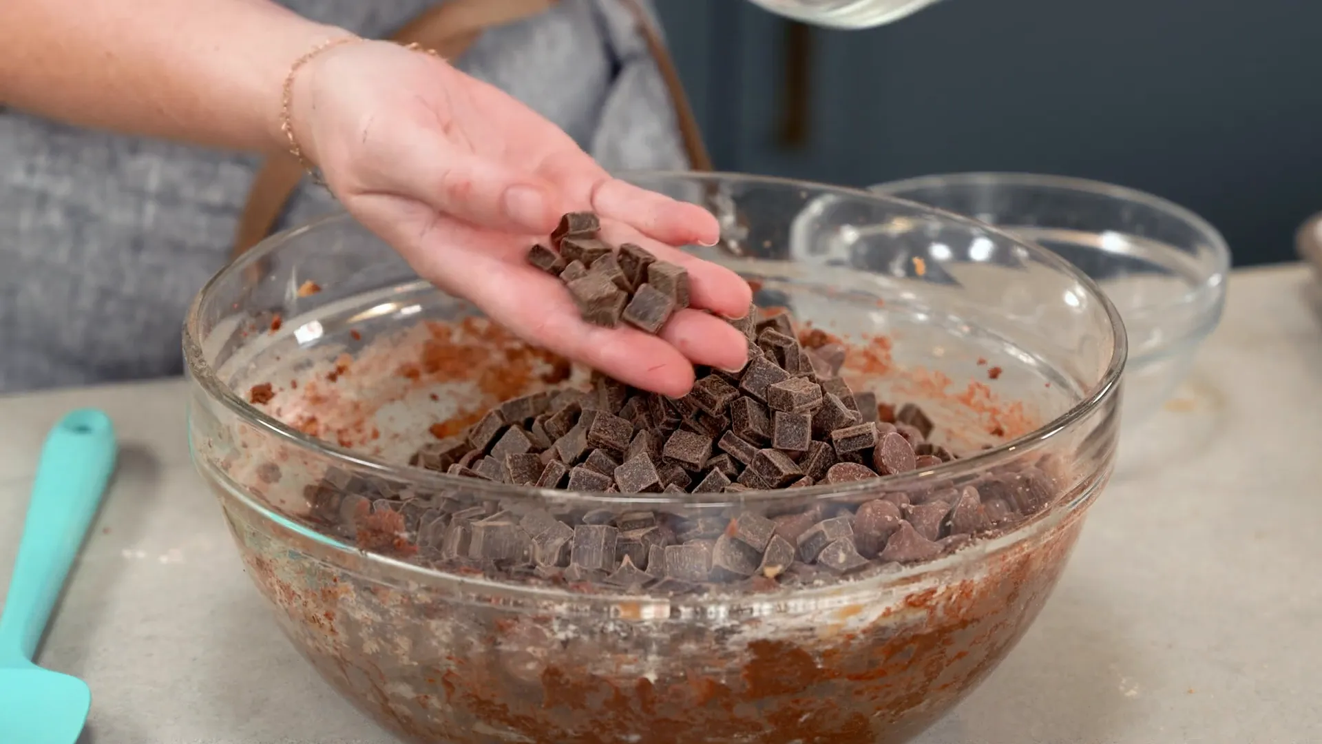 Close-up of dark chocolate chunks ready to be folded into dough