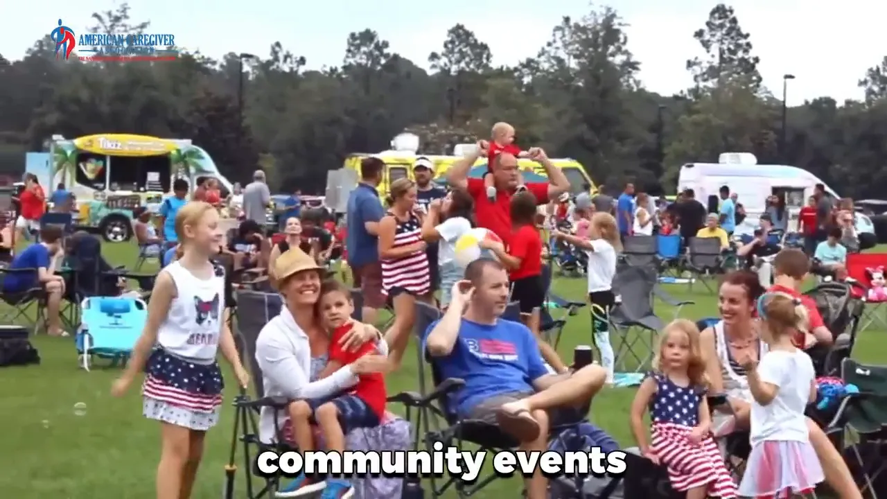 outdoor community gathering with seated families and children on a field