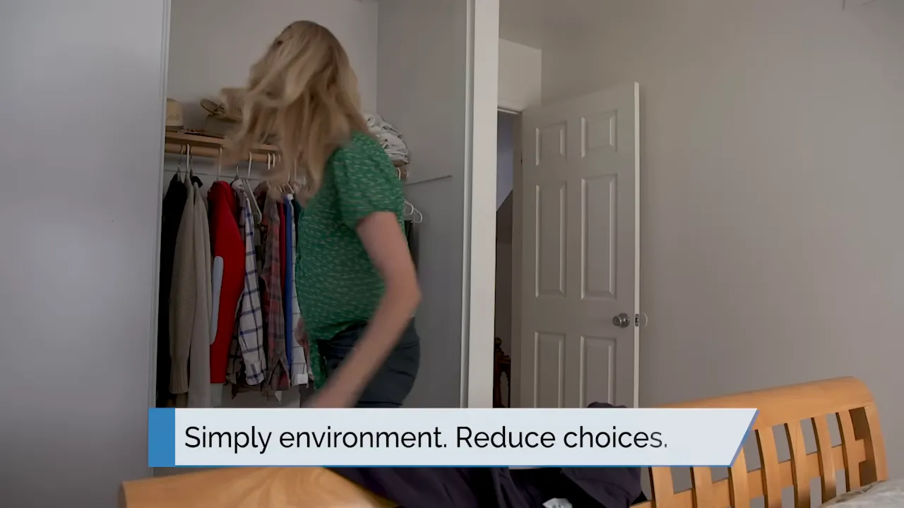 woman removing clothing from a closet with on-screen text about simplifying the environment and reducing choices