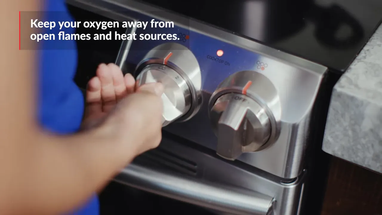 Close-up of a lit gas stove burner with on-screen safety text about oxygen and heat sources