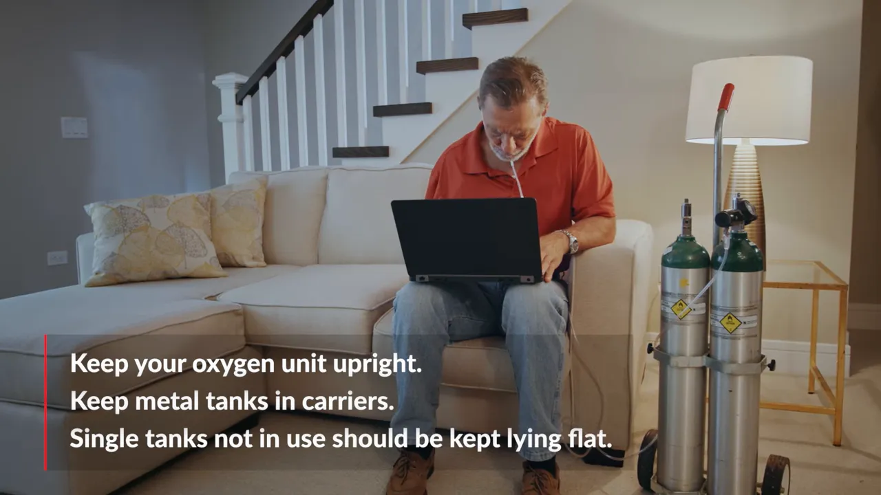 Living room scene with oxygen tanks beside a sofa and on-screen storage instructions for upright units and flat unused tanks