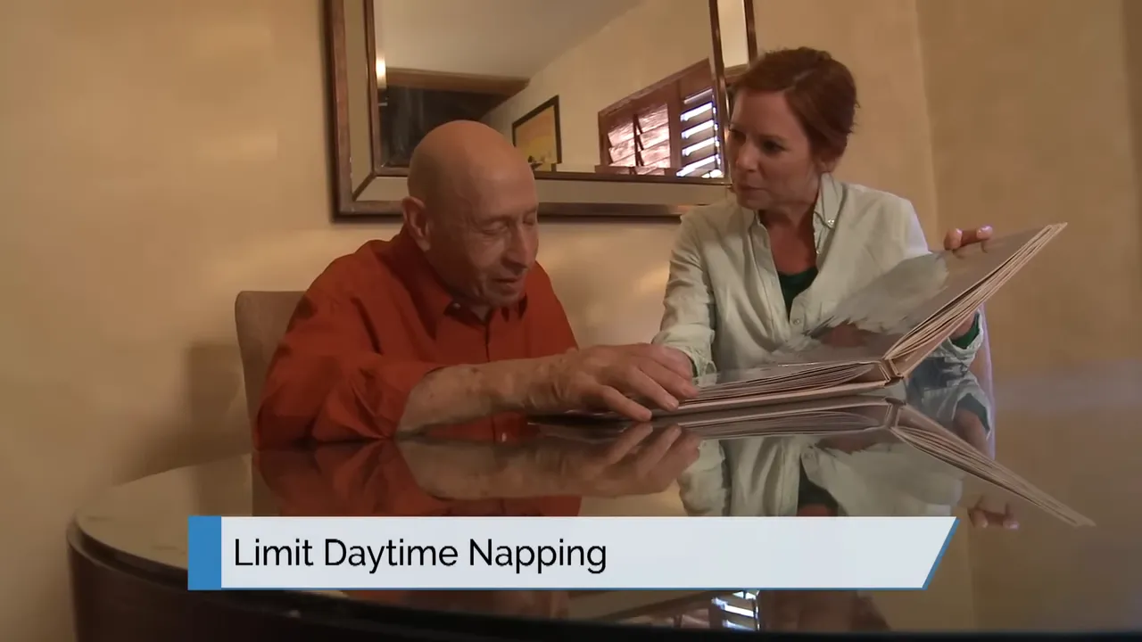 older man and caregiver looking at a photo album with on-screen text limit daytime napping
