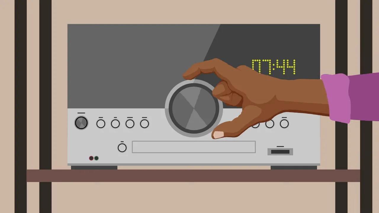 Stereo system with hand turning a large knob and equalizer bars displayed on screen