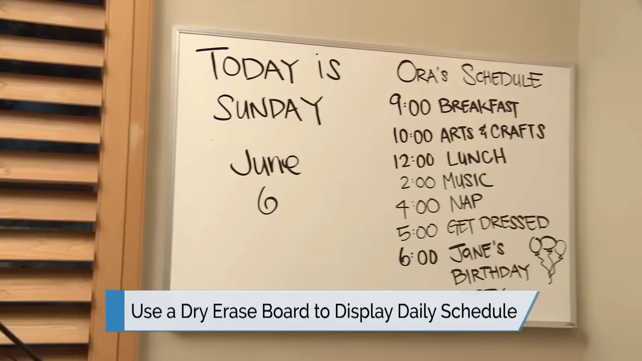 whiteboard showing today's date and a handwritten daily schedule