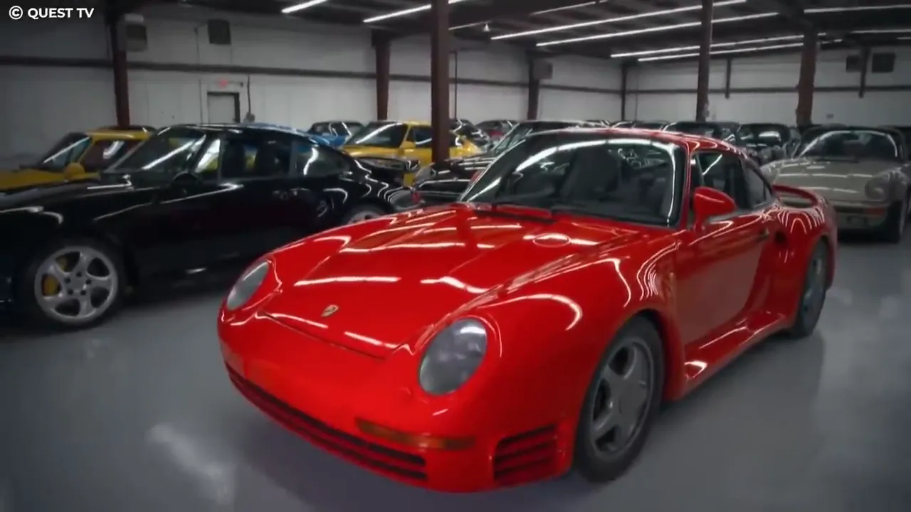 Red Porsche sports car parked in a private garage among other high-end cars