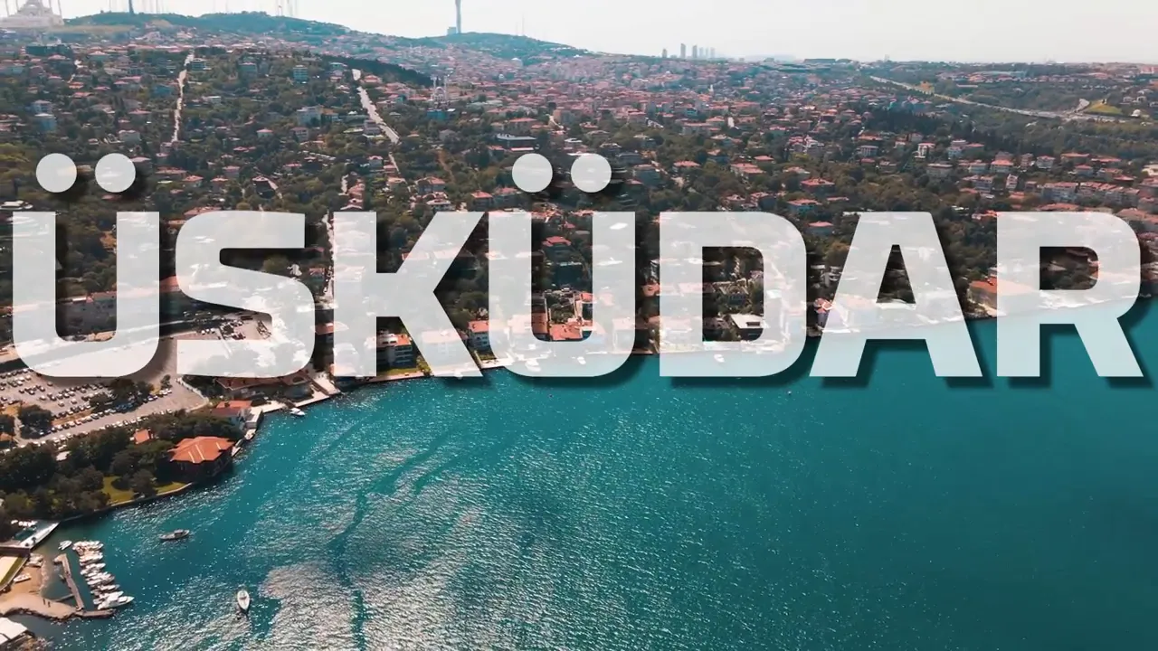 High-resolution drone shot of &Uuml;sk&uuml;dar coastline with the word '&Uuml;SK&Uuml;DAR' overlaid across the scene