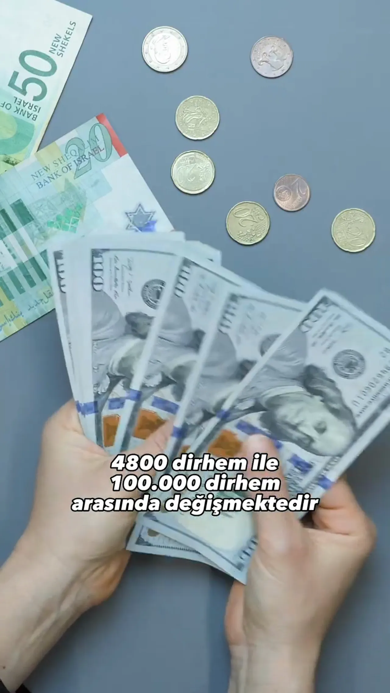 Ellerin arasında ABD doları ve farklı para birimleri masada