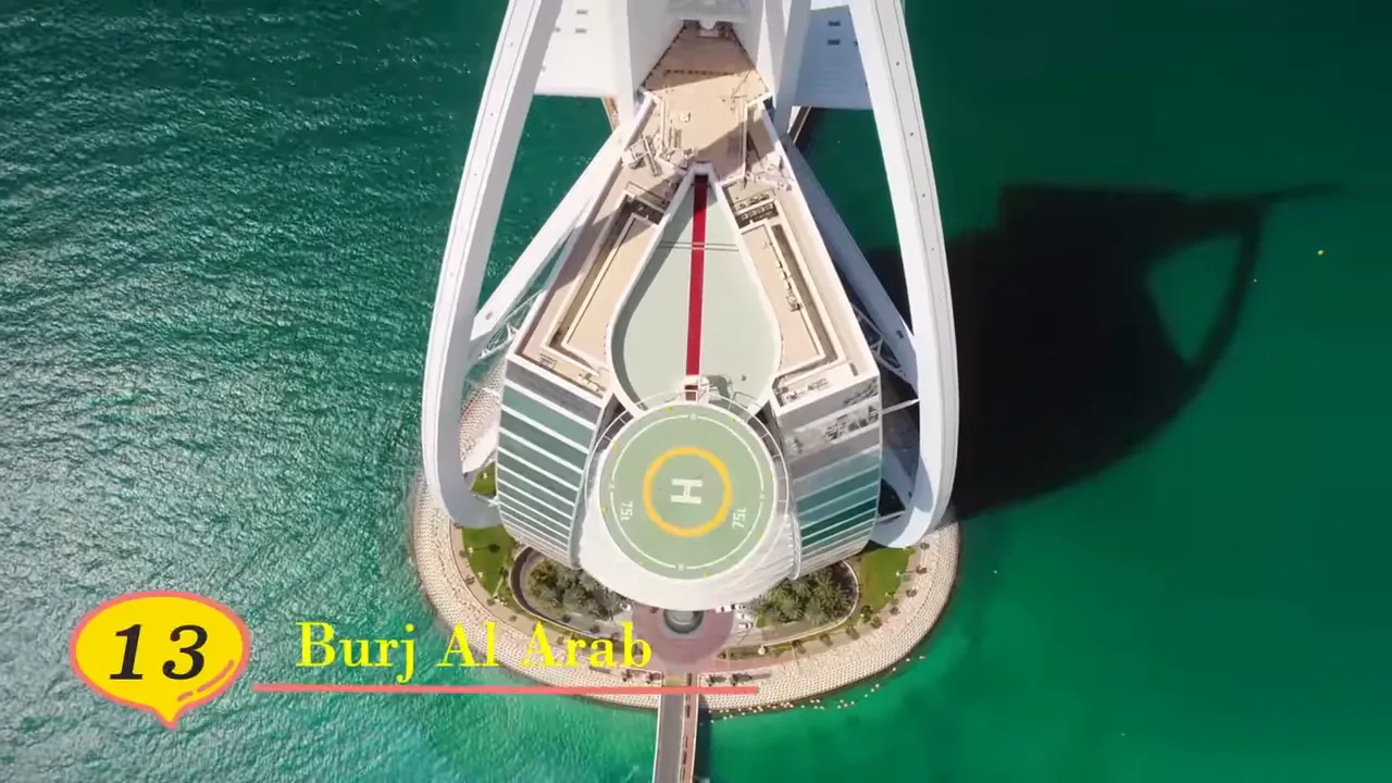 Top-down aerial view of the Burj Al Arab hotel showing the circular helipad and surrounding water