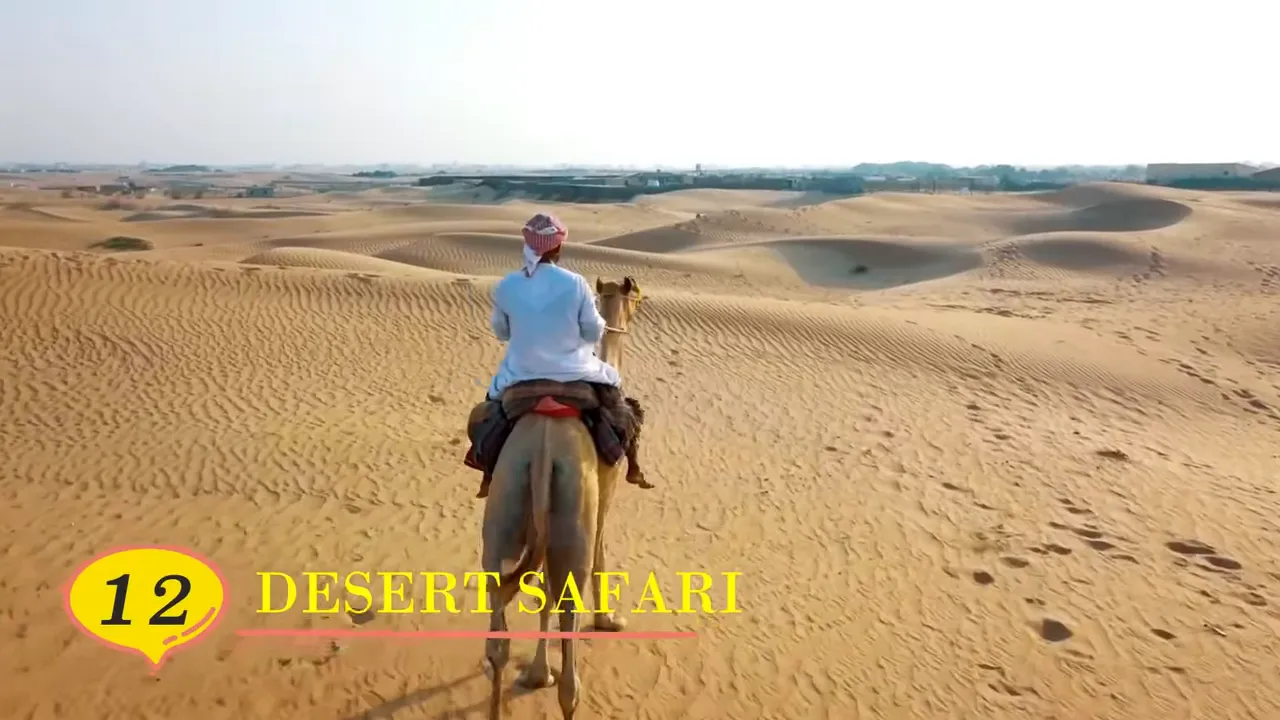 Rider on a camel crossing expansive sand dunes during a Dubai desert safari