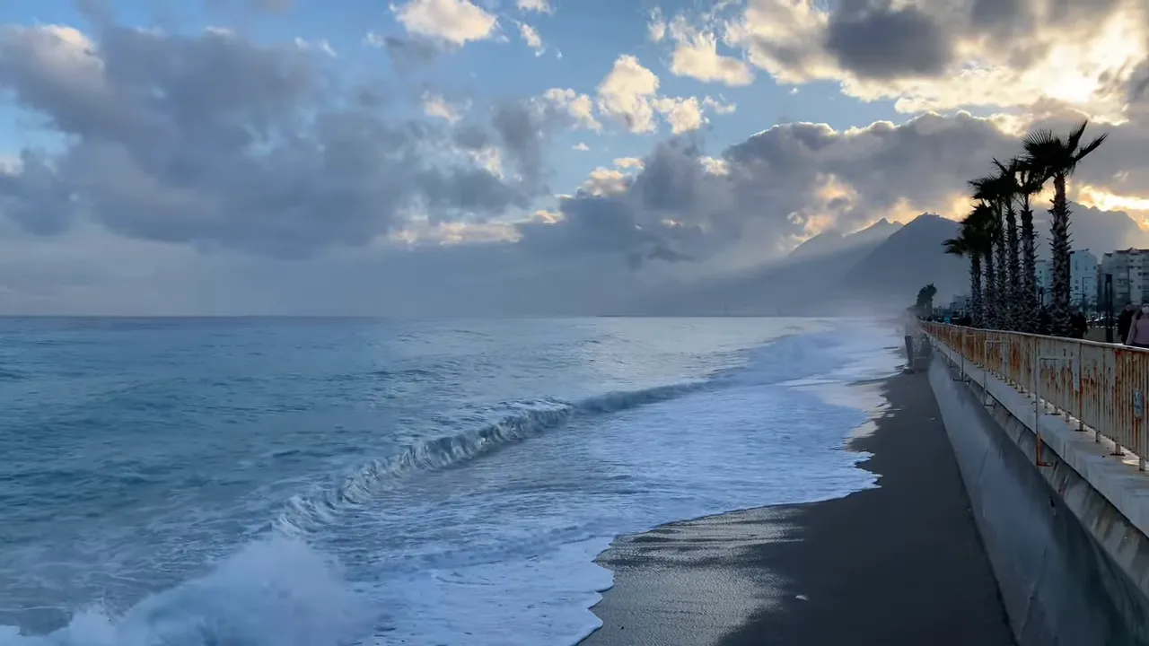 Panoramic view of Antalya coast, palm promenade and mountains from T&uuml;nektepe