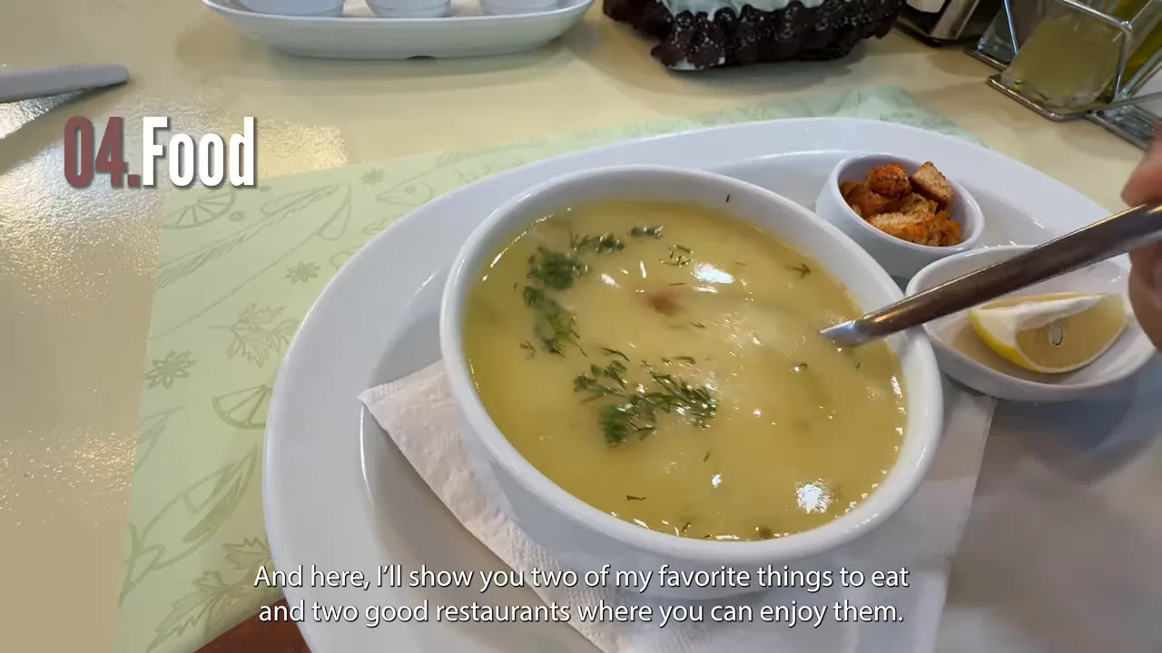 Bowl of fish soup served with herbs and lemon on B&uuml;y&uuml;kada