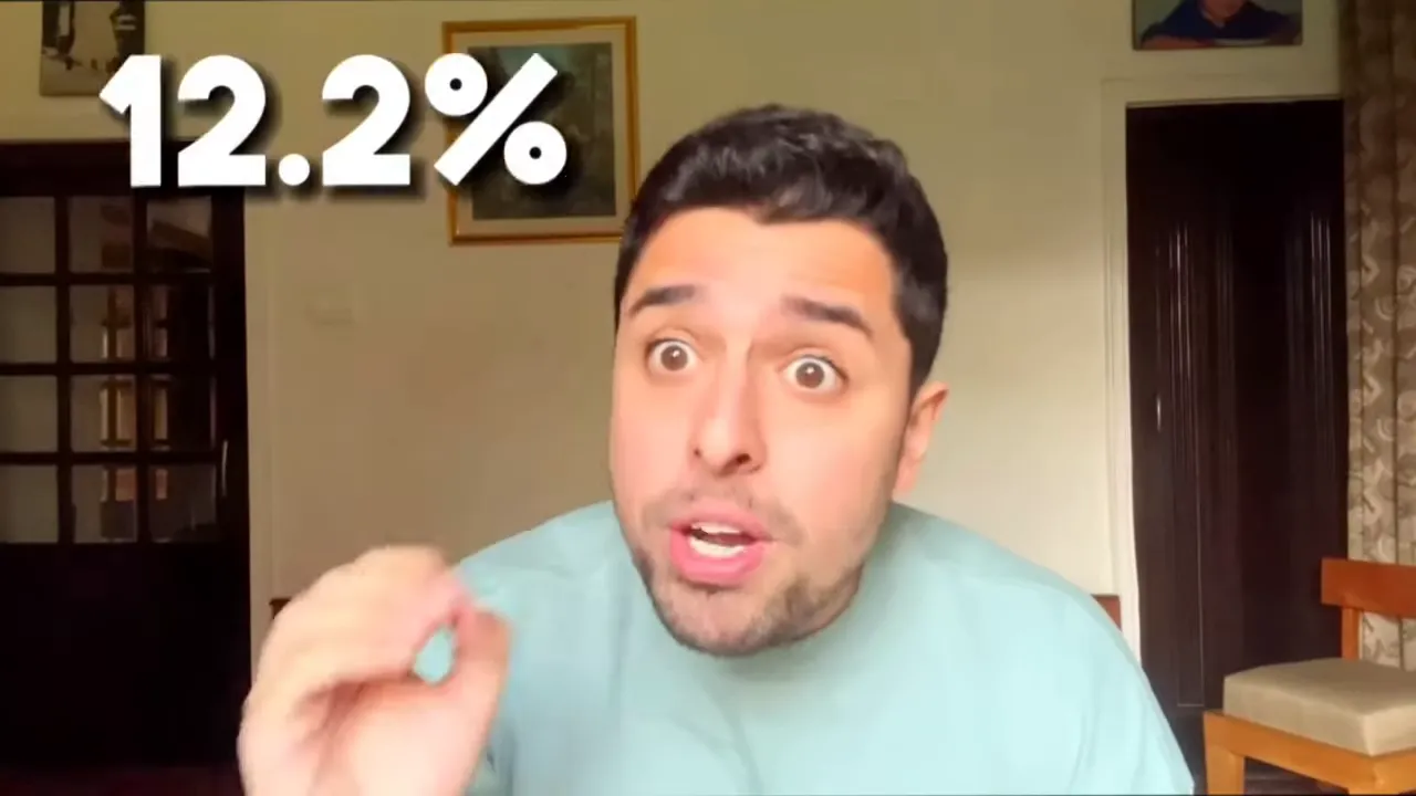 Presenter with prominent '12.2%' text overlay indicating an acceptance rate.