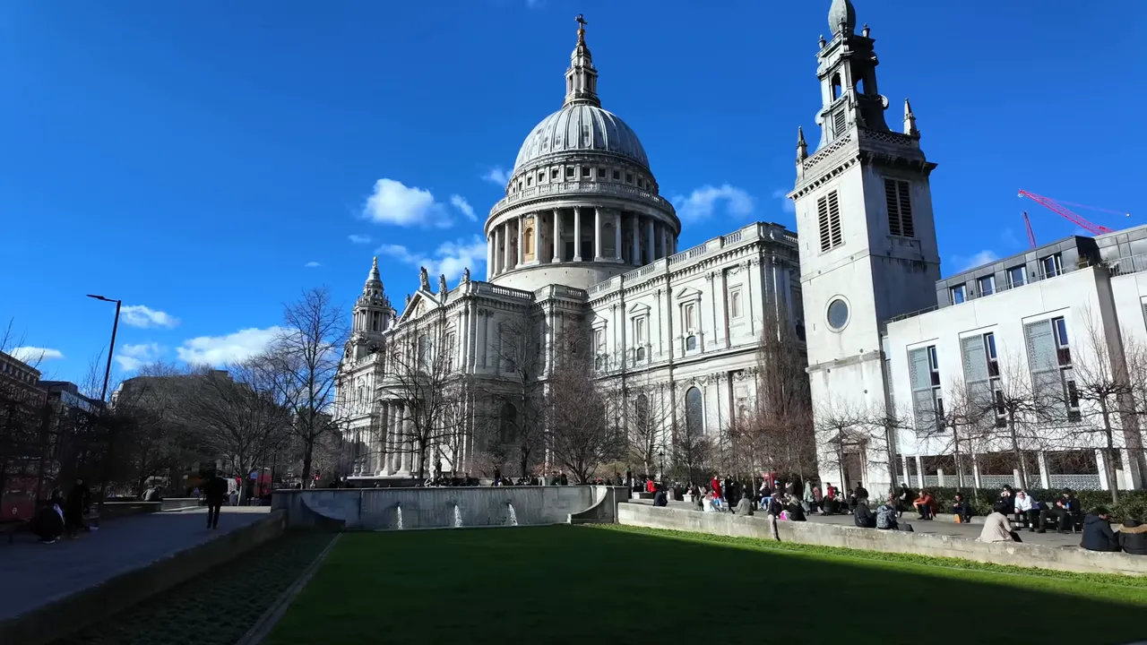 Wide, high-quality photo of St Paul's Cathedral with the lawn and plaza in the foreground