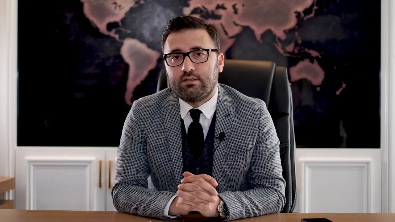 Host in office describing required documents to bring a foreign car into Turkey