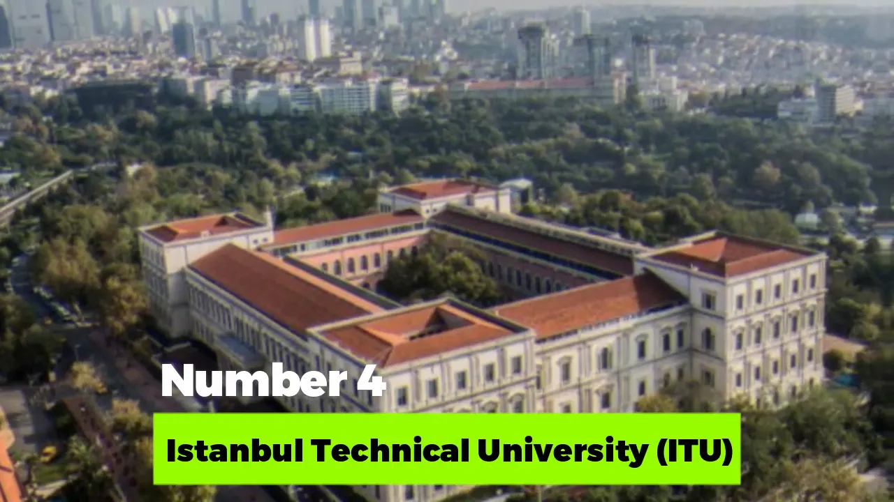 Aerial shot of Istanbul Technical University main building with red roofs and surrounding greenery.
