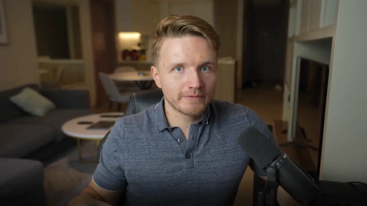 Clear close-up of presenter speaking into a microphone giving application advice
