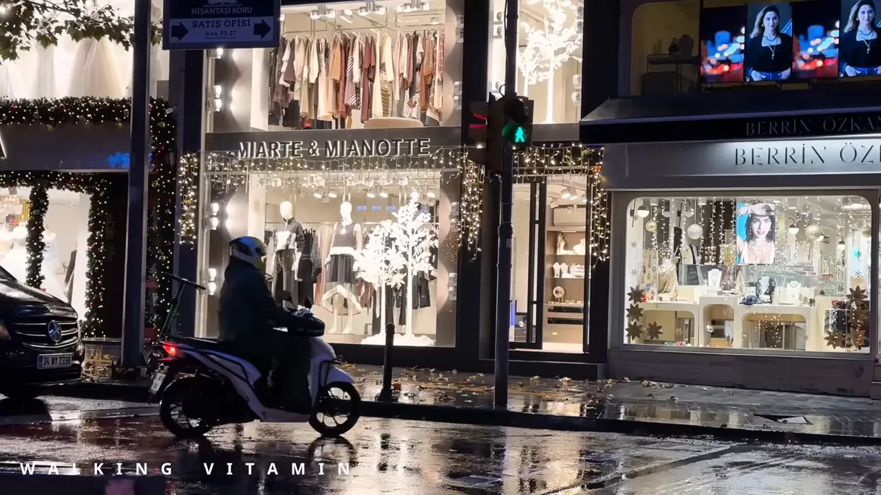 Nisantasi night street with illuminated boutique windows, holiday lights and wet pavement reflections with a scooter passing by