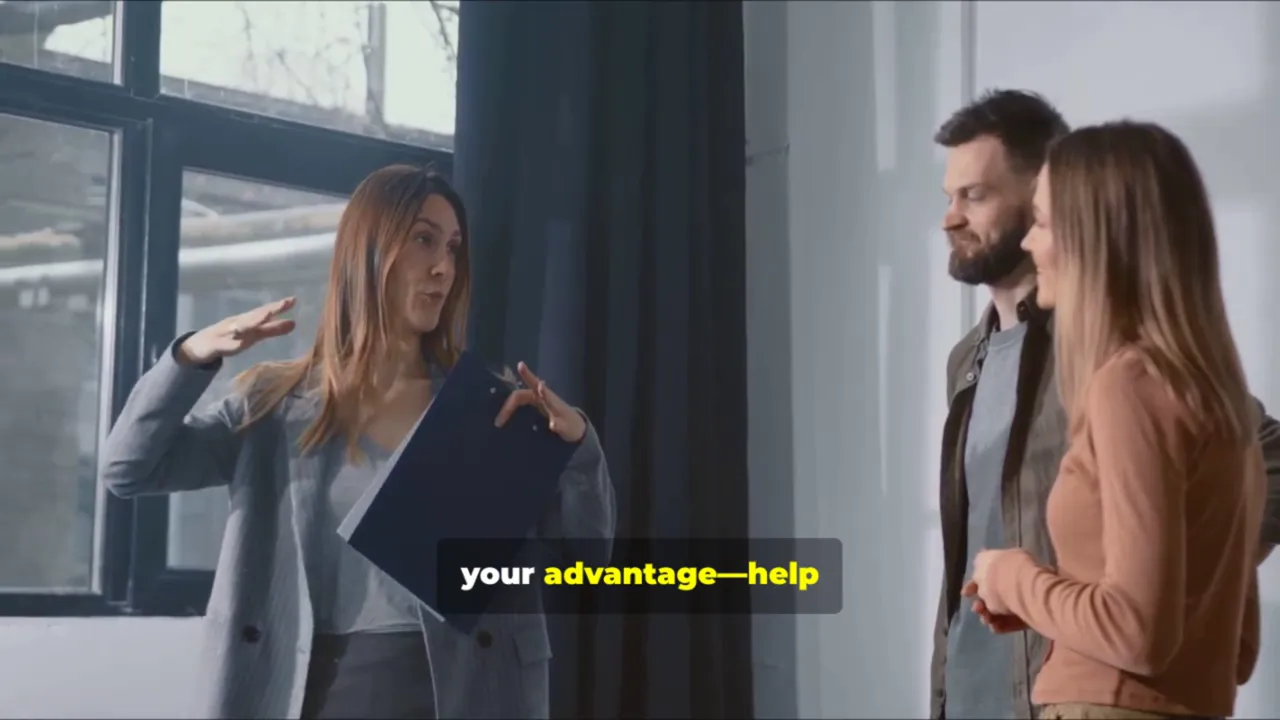 Agent gesturing while explaining compliance to a landlord couple in a property