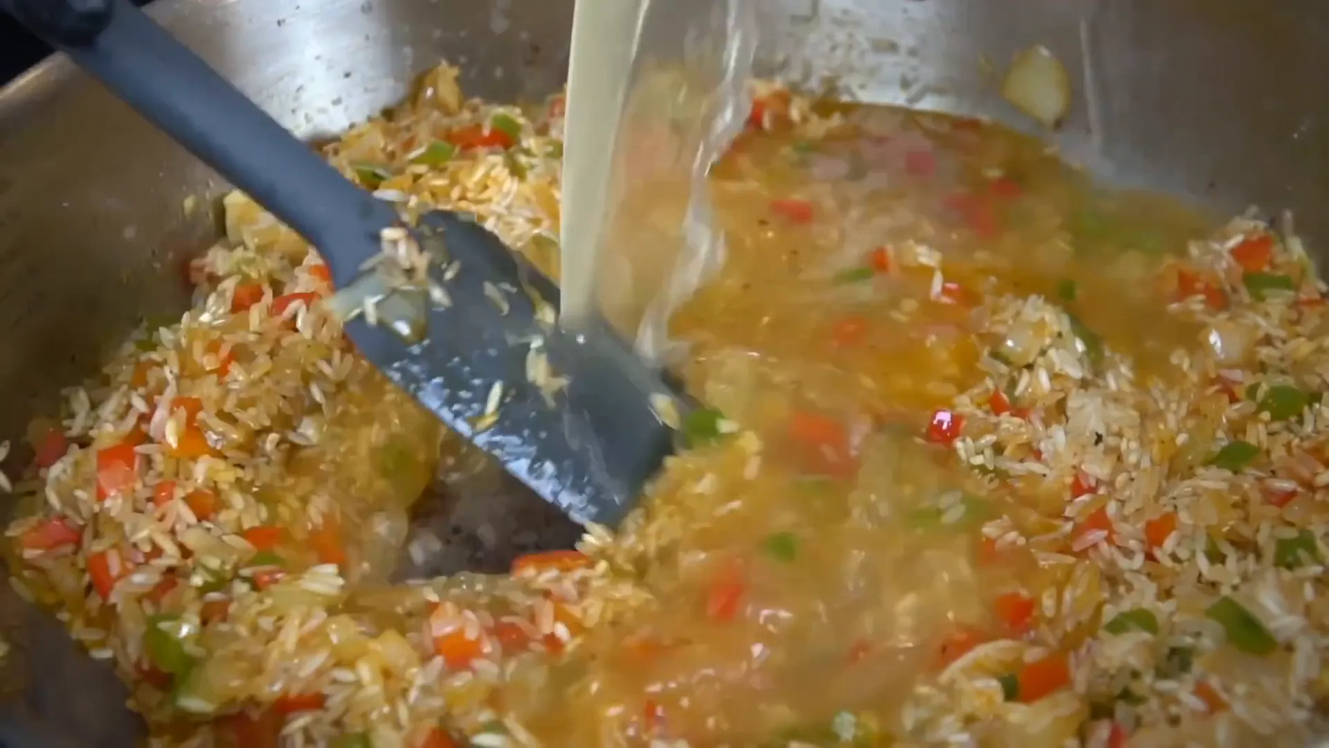 Adding chicken broth