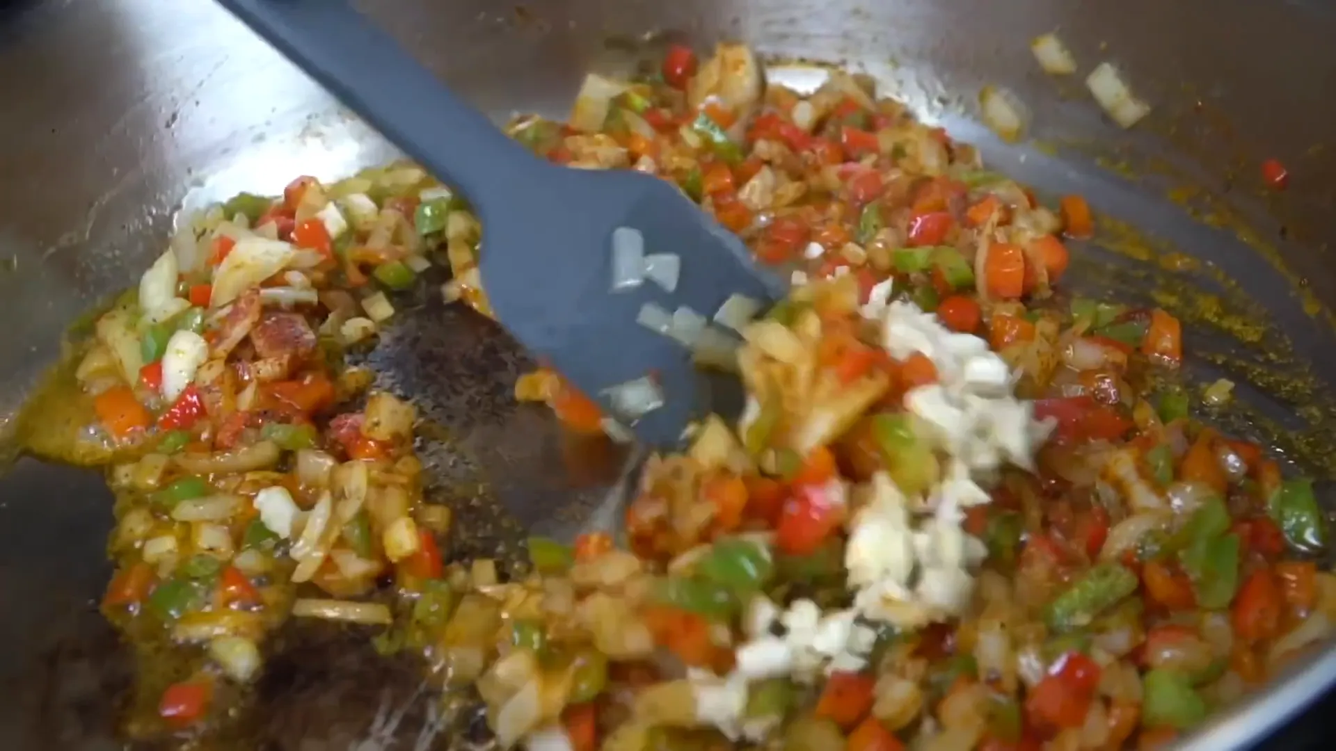 Adding garlic to veggies